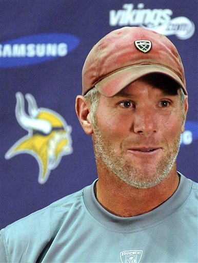 FILE - This Aug. 18, 2009, file photo shows Minnesota Vikings quarterback Brett Favre speaking during a news conference at the NFL football team's training facility, in Eden Prairie, Minn.  A person with knowledge of the situation tells The Associated Press that Brett Favre has informed the Vikings he will not return to Minnesota for a second season. The person spoke on condition of anonymity Tuesday, Aug. 3, 2010,  because the team had not made an official announcement. (AP Photo/Hannah Foslien, FIle) (AP)