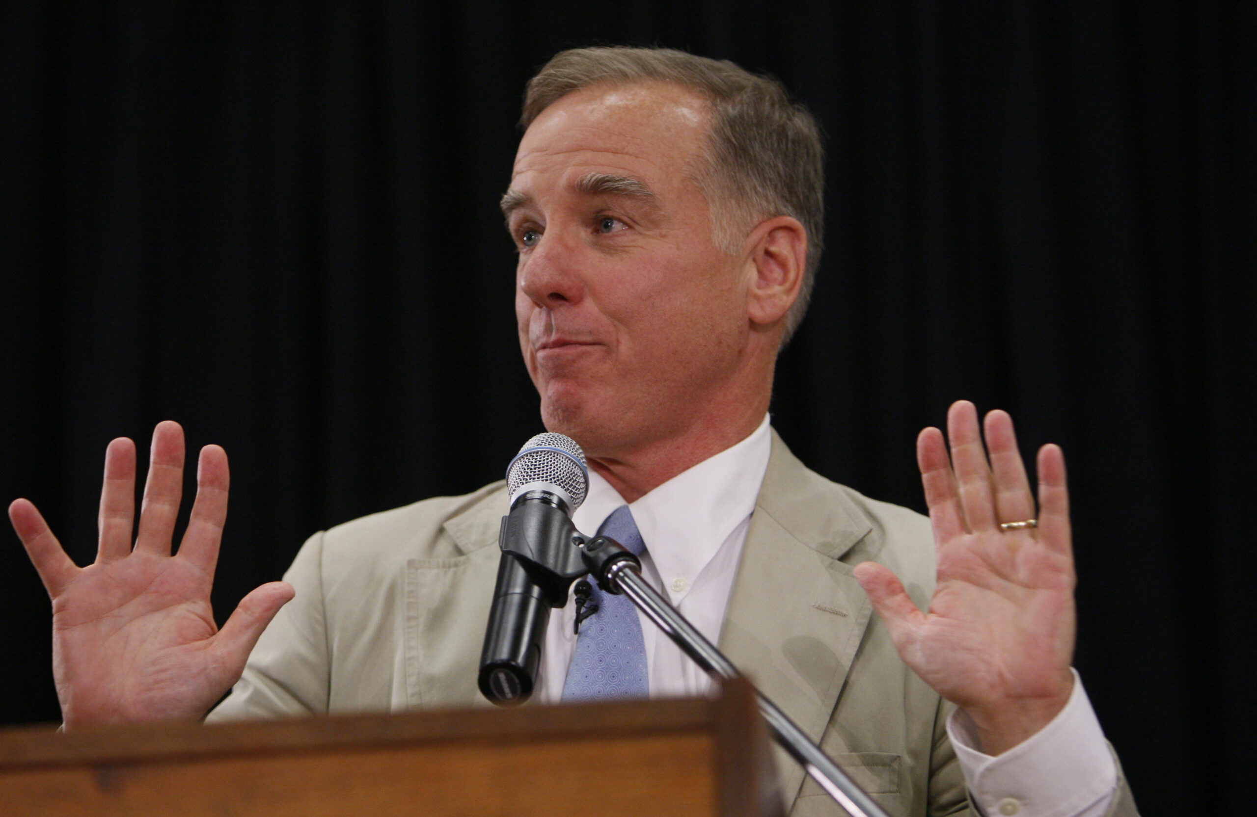 Former Vermont Gov. Howard Dean gestures as he answers a question at a town hall style meeting on health care reform hosted by Dean and Rep. Jim Moran, D-Va., at South Lakes High School in Reston, Va., Tuesday, Aug. 25, 2009.(AP Photo/Charles Dharapak) (Associated Press)