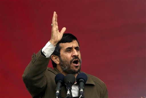 FILE -- In a Feb. 11, 2008 file photo Iranian President Mahmoud Ahmadinejad, speaks during a rally to celebrate the 29th anniversary of the 1979 Islamic Revolution at Azadi Square, Tehran, Iran. The website, khabaronline.ir, says a handmade grenade has exploded near President Mahmoud Ahmadinejad's convoy in western Iran. (AP Photo/Hasan Sarbakhshian/ file) (AP)