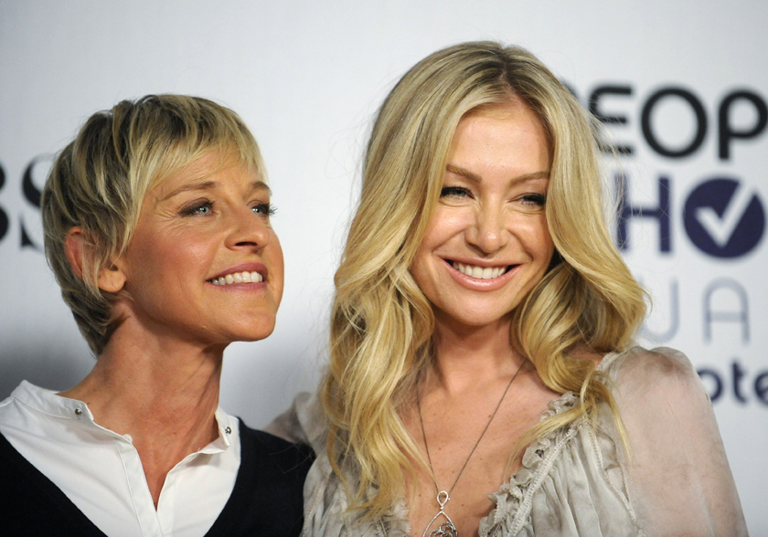Comedian Ellen Degeneres (L) and actress Portia de Rossi pose backstage after Degeneres won the award for Favorite Talk Show Host at the 35th annual People's Choice awards in Los Angeles January 7, 2009.     REUTERS/Phil McCarten (UNITED STATES) (Â© Phil Mccarten / Reuters)