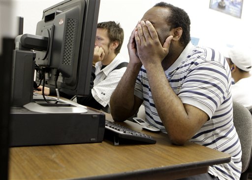 FILE - In this file photo made July 20, 2010, Orlando Payton uses a computer to look for a job at JobTrain employment office in Menlo Park, Calif. First-time claims for jobless benefits edged up by 2,000 to a seasonally adjusted 484,000, the Labor Department said Thursday, Aug. 12, 2010. Analysts had expected a drop. That's the highest total since February. (AP Photo/Paul Sakuma, File) (AP)