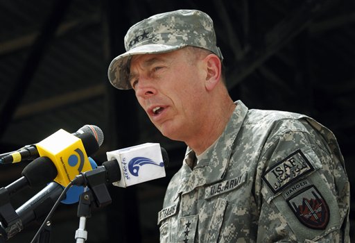 FILE - In this July 15, 2010, file photo U.S. Gen. David Petraeus, commander of the NATO and U.S. forces in Afghanistan, speaks during an oath taking ceremony of recruited Afghan soldiers at the Ghazi Military Training Center in Kabul, Afghanistan. In comments from Kabul broadcast Sunday, Aug. 15, 2010, Petraeus said progress in Afghanistan only began this spring and needs time to take root. "We're here so that Afghanistan does not once again become a sanctuary for transnational extremists the way it was when al-Qaida planned the 9/11 attacks in the Kandahar area," he said. (AP Photo/Musadeq Sadeq, File) (AP)