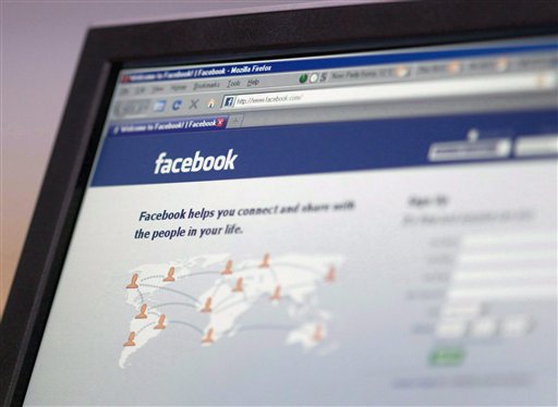 FILE -- In this August 27, 2009 file photo, the social networking site Facebook login webpage is seen on a computer screen in Ottawa, Can. A German data protection official said Wednesday, July 7, 2010, he launched legal proceedings against Facebook, which he accused of illegally accessing and saving personal data of people who don't use the social networking site. (AP Photo.The Canadian Press, Adrian Wyld, file) (AP)
