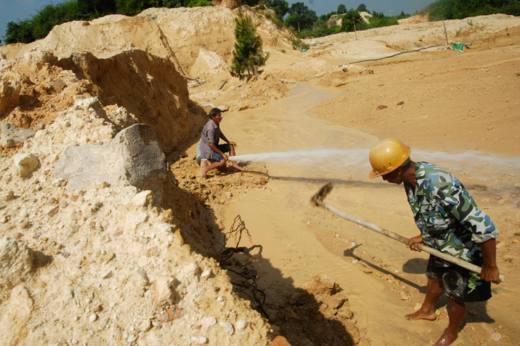 Chinese laborers at a rare earth mine in Jiangxi province on August 6, 2010.