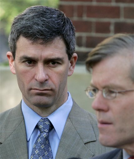 Virginia Attorney General Ken Cuccinelli, left, listens as Gov. Bob McDonnell speaks during a ceremony on Friday, April 16, 2010 at the Capitol in Richmond, Va., marking the third anniversary of the shootings at Virginia Tech, where 32 people plus the shooter died. (AP Photo/Steve Helber) (AP)