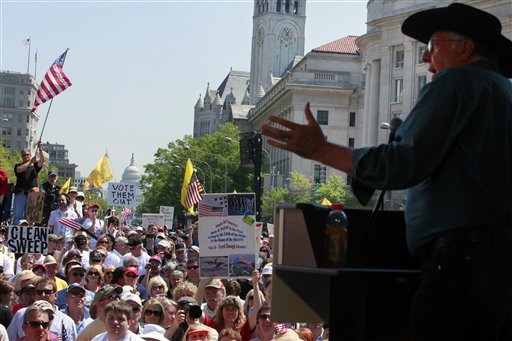 With the Capitol in the background, former House Majority Leader Dick Armey addresses a Tea Party rally at Freedom Plaza in Washington, Thursday, April 15, 2010. (AP Photo/Jacquelyn Martin) (AP)