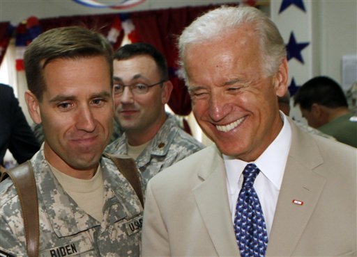 In this July 4, 2009 photo, U.S. Vice President Joe Biden, right, is seen with his son, U.S. Army Capt. Beau Biden, at Camp Victory on the outskirts of Baghdad, Iraq. Vice President Joe Biden's son was being treated at a Delaware hospital, the White House said Tuesday, though it did not provide information about what might be wrong. Delaware Attorney General Beau Biden was awake and alert and communicating with his parents and wife, who were with him at Christiana Hospital in Newark. (AP Photo/Khalid Mohammed) (AP)