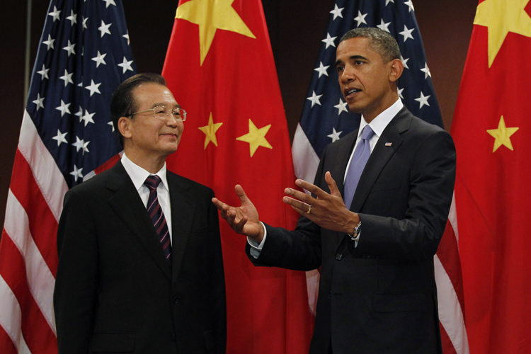 U.S. President Barack Obama gestures alongside China's Premier Wen Jiabao before their bilateral meeting at the United Nations in New York, September 23, 2010.    REUTERS/Jason Reed  (UNITED STATES - Tags: POLITICS) (Â© Jason Reed / Reuters)