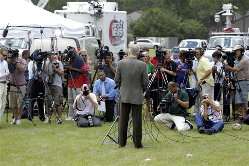 Pastor Terry Jones, center, of the Dove World Outreach Center speaks at a new conference in Gainesville, Fla., Wednesday, Sept. 8, 2010. Jones stated that he is going forward with a scheduled burning of copies of the Quran at his church on Saturday, Sept. 11. (AP Photo/John Raoux) (AP)