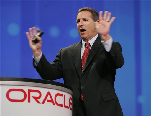 FILE - In this Oct. 24, 2006 file photo shows then, Hewlett Packard CEO Mark Hurd gestures during a keynote address at the Oracle Open World conference in San Francisco. Oracle Corp. has hired former Hewlett-Packard Co. CEO Mark Hurd to help lead the database software maker in a pivotal moment in Oracle's 33-year history as it tries to muscle in on more of HP's turf Monday, Sept. 6, 2010.(AP Photo/Paul Sakuma, file) (AP)