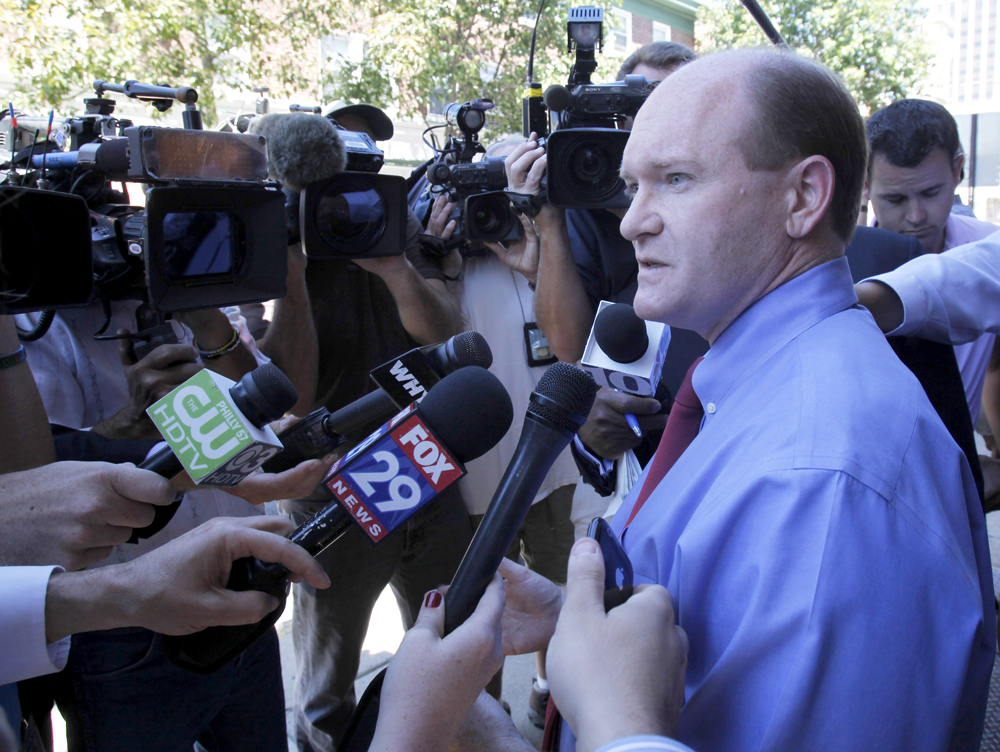 Delaware Democratic Senate candidate Chris Coons talks with reporters after a visit to Libby's Restaurant, Wednesday, Sept. 15, 2010, in Wilmington, Del. Coons will face Republican Christine O'Donnell in the November election. (AP Photo/Rob Carr) (Rob Carr)