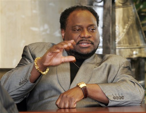 FILE - In this Jan. 18 2007 file photo, Bishop Eddie Long, of the New Birth Missionary Baptist Church, in Lithonia, Ga. gestures during an interview in Lithonia. Two men on Tuesday, Sept. 21, 2010 filed a lawsuit accusing Long of exploiting his role as pastor of an Atlanta-area megachurch to coerce them into sexual relationships when they were members of his congregation. (AP Photo/Gene Blythe, File) (AP)