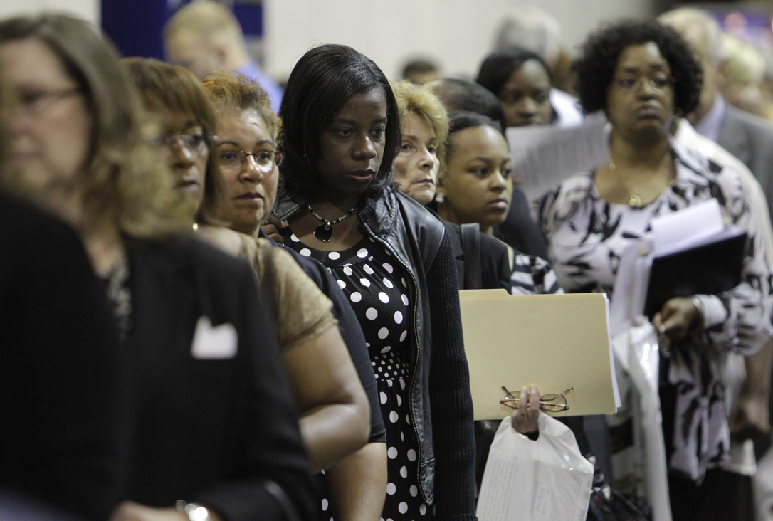 Job seekers attend a job fair in Southfield, Mich. (AP/Paul Sancya)