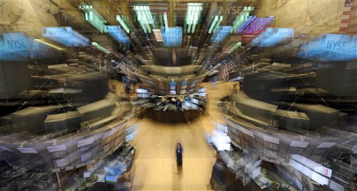 FILE - In this Aug. 19, 2010 file photograph, shot with a zoom lens, traders at work on the trading floor of the New York Stock Exchange, in New York. The economic outlook is weakening, home sales are plunging and stocks are on a four-month slide capped by a disappointing August. Now the potentially even scarier part for investors: We are entering what is historically the worst month in the market. (AP Photo/Henny Ray Abrams, file) (AP)