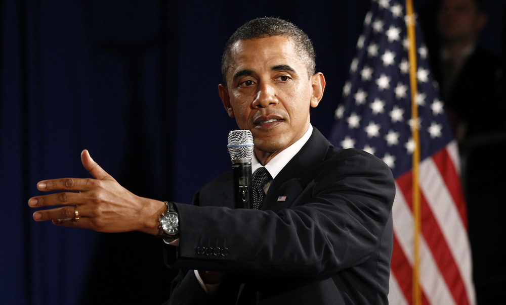 U.S. President Barack Obama participates in a "Commit to Vote Tele-Town Hall Webcast" at George Washington University in Washington October 12, 2010. REUTERS/Kevin Lamarque (UNITED STATES - Tags: POLITICS) (Â© Kevin Lamarque / Reuters)