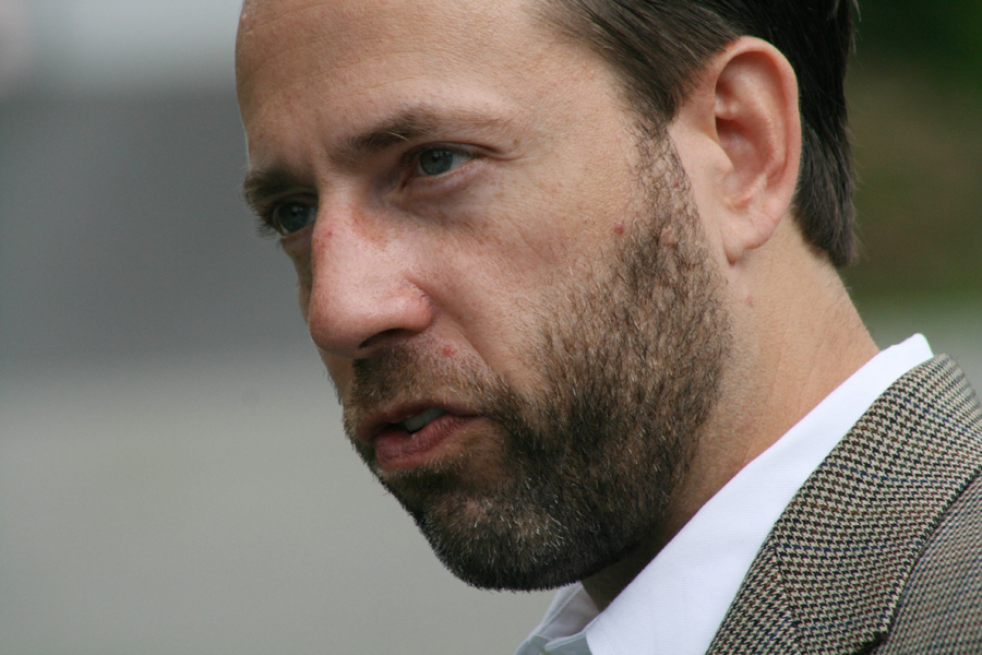 In this photo taken Monday, Aug. 2, 2010, Alaska Senate candidate Joe Miller campaigns door-to-door in Anchorage, Alaska. Miller, a decorated combat veteran, former judge and blame-Washington candidate, has the support of the tea party movement and the backing of former Alaska Gov. Sarah Palin in his bid to unseat Sen. Lisa Murkowski in the Aug. 24 Alaska Republican primary election. (AP Photo/Mark Thiessen) (Mark Thiessen)