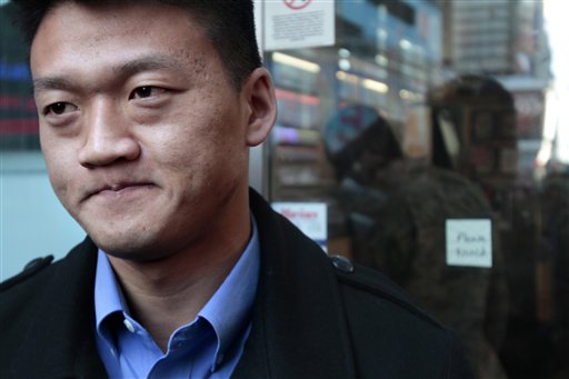 Dan Choi, an Iraq War veteran and a West Point graduate who was discharged from the military in July because he announced publicly that he is gay, reacts as he waits to enter the U.S. Armed Forces Recruiting Center in Times Square, hoping to re-enlist on Tuesday, Oct. 19, 2010, in New York.  (AP Photo/Bebeto Matthews) (AP)