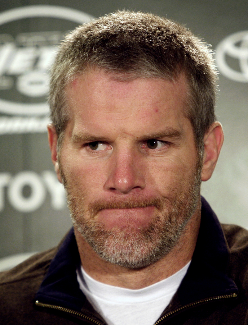 New York Jets quarterback Brett Favre reacts during a news conference after their loss to the Miami Dolphins in their NFL football game in East Rutherford, New Jersey, December 28, 2008. REUTERS/Mike Segar (UNITED STATES) (Â© Mike Segar / Reuters)