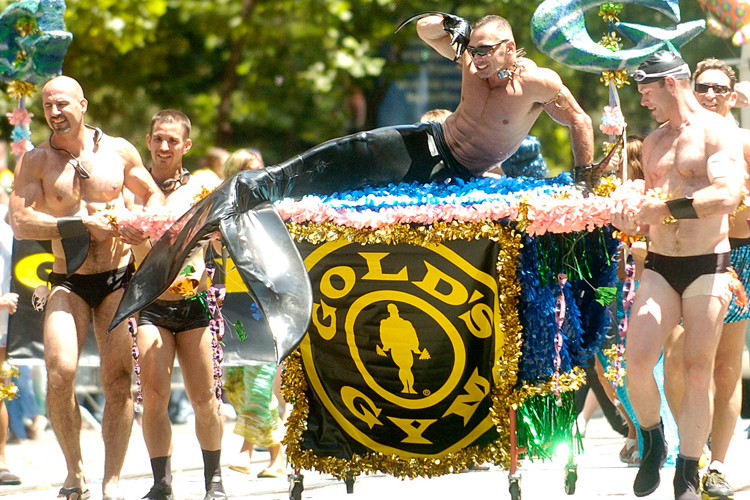 Men from a Gold's Gym contingent march in San Francisco's annual Gay Pride Parade in June, 2006.