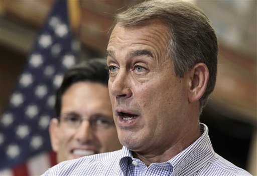 FILE - In this Sept. 23, 2010 file photo,  House Minority Leader John Boehner of Ohio, right, accompanied by House Minority Whip Eric Cantor of Va., speaks at a lumber yard in Sterling, Va.  If you don't like the economy, blame President Barack Obama and Democrats_ they're making times tougher, Republicans are telling voters entering the four-week home stretch to an election they hope will return them to power in Congress.(AP Photo/J. Scott Applewhite, File) (AP)