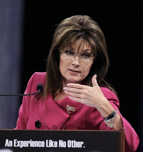 Former Republican vice presidential candidate Sarah Palin gestures while addressing the National Quartet Convention in Louisville, Ky., Thursday, Sept. 16, 2010.  (AP Photo/Ed Reinke) (AP)