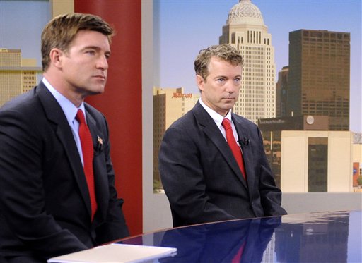 FILE - In this Oct. 3, 2010 file photo, Kentucky Senate candidates, Democrat Jack Conway, left, and Republican Rand Paul, prepare for their debate in Louisville, Ky.  Candidates have been slinging mud from afar for months, their insults filling TV ads and peppering speeches. Now, they're meeting up close _ in many cases for the only time _ and getting right in each other's faces.   (AP Photo/Patti Longmire, File) (AP)