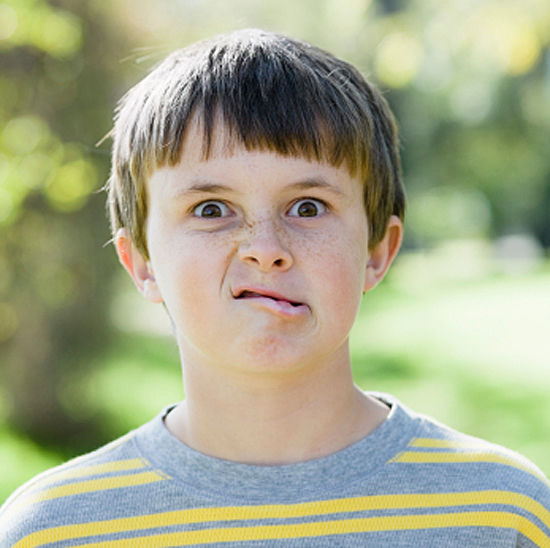 Portrait of a Cute Boy Making a Silly Face