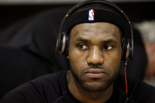 Miami Heat player LeBron James listens to music after training camp at Hurlburt Field Wednesday, Sept. 29, 2010,  in Hurlburt Field, Fla. (AP Photo/Wilfredo Lee) (AP)