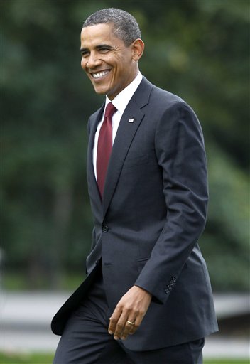 President Barack Obama walks on the South Lawn of the White House in Washington, Wednesday, Oct. 6, 2010, to board Marine One helicopter as he travels to Newark, N.J. (AP Photo/Charles Dharapak) (AP)