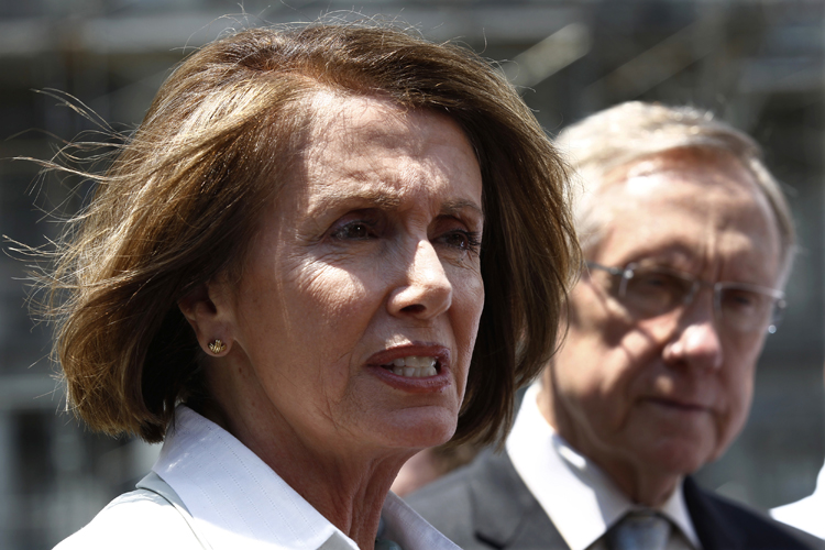 Democrat leaders Nancy Pelosi and Harry Reid (R) speak after a bipartisan meeting with President Barack Obama at the White House in Washington June 10, 2010. REUTERS/Kevin Lamarque (UNITED STATES - Tags: POLITICS) (Â© Kevin Lamarque / Reuters)