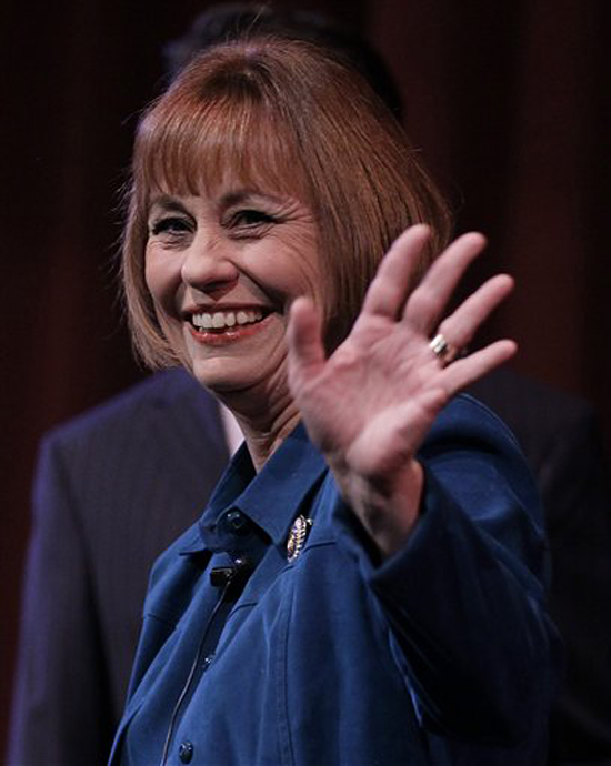 FILE - In this Sept. 23, 2010 file photo, Nevada Republican Senate candidate Senate Sharron Angle acknowledges supporters as she walks on stage for a candidate forum, at Faith Lutheran High School in Las Vegas. (AP Photo/Julie Jacobson, File) (Julie Jacobson)