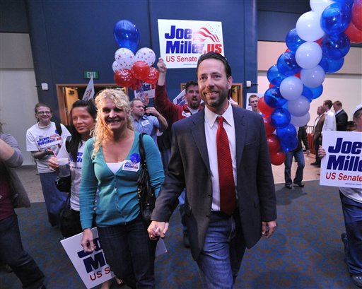 Republican candidate for U.S. Senate Joe Miller and his wife Kathleen enter election central in Anchorage, Alaska Tuesday Aug. 24, 2010.  Returns showed Miller ahead of incumbent senator Lisa Murkowski.  ( AP Photo/Michael Dinneen) (AP)