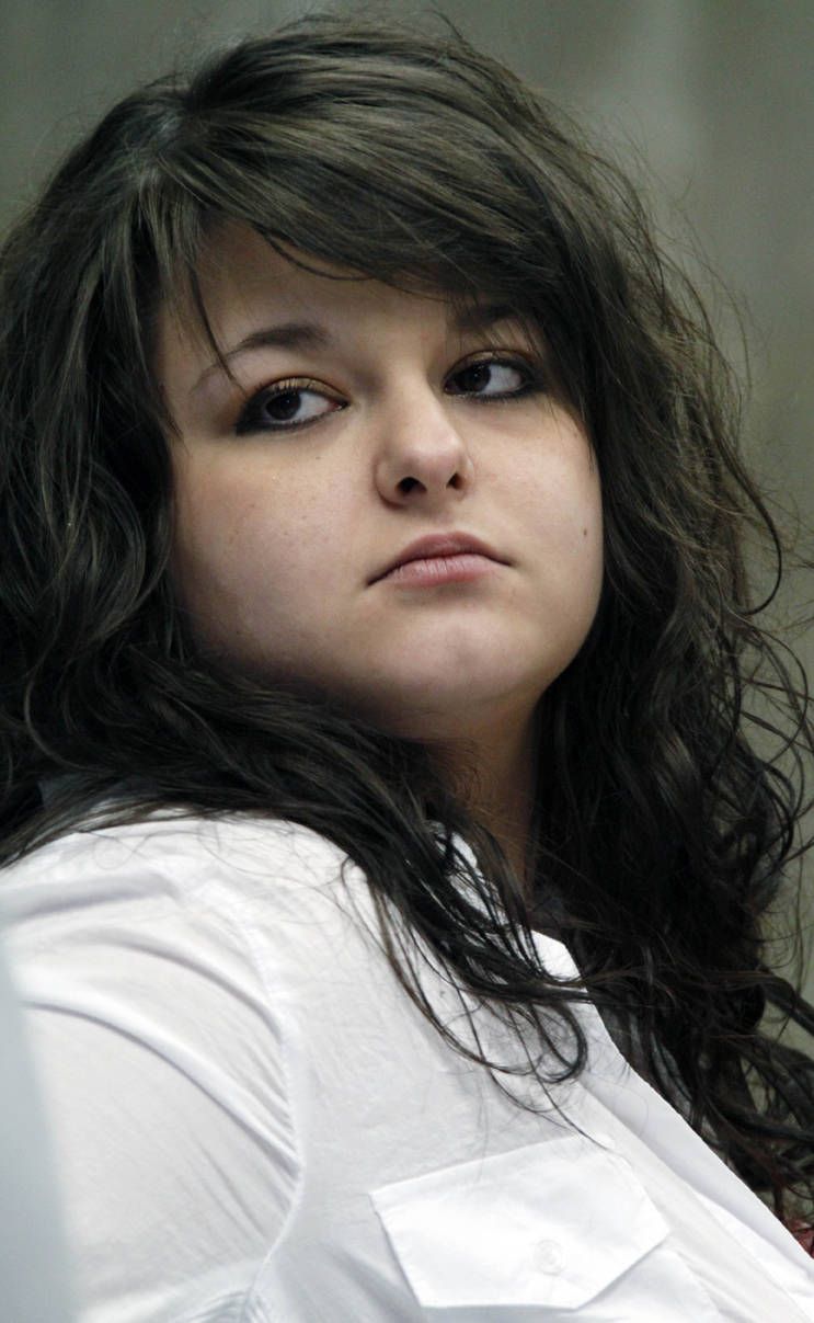 FILE - Constance McMillen, an 18-year-old senior at Itawamba County Agricultural High School, is seen in a Monday, March 22, 2010 photo as she leaves the federal courthouse in Aberdeen, Miss. A federal judge ruled Tuesday that a Mississippi school district violated McMillen's rights by refusing to allow her to bring her girlfriend to the prom, but he said he would not force the school to hold the event.(AP Photo/Rogelio V. Solis, File) (Rogelio V. Solis)