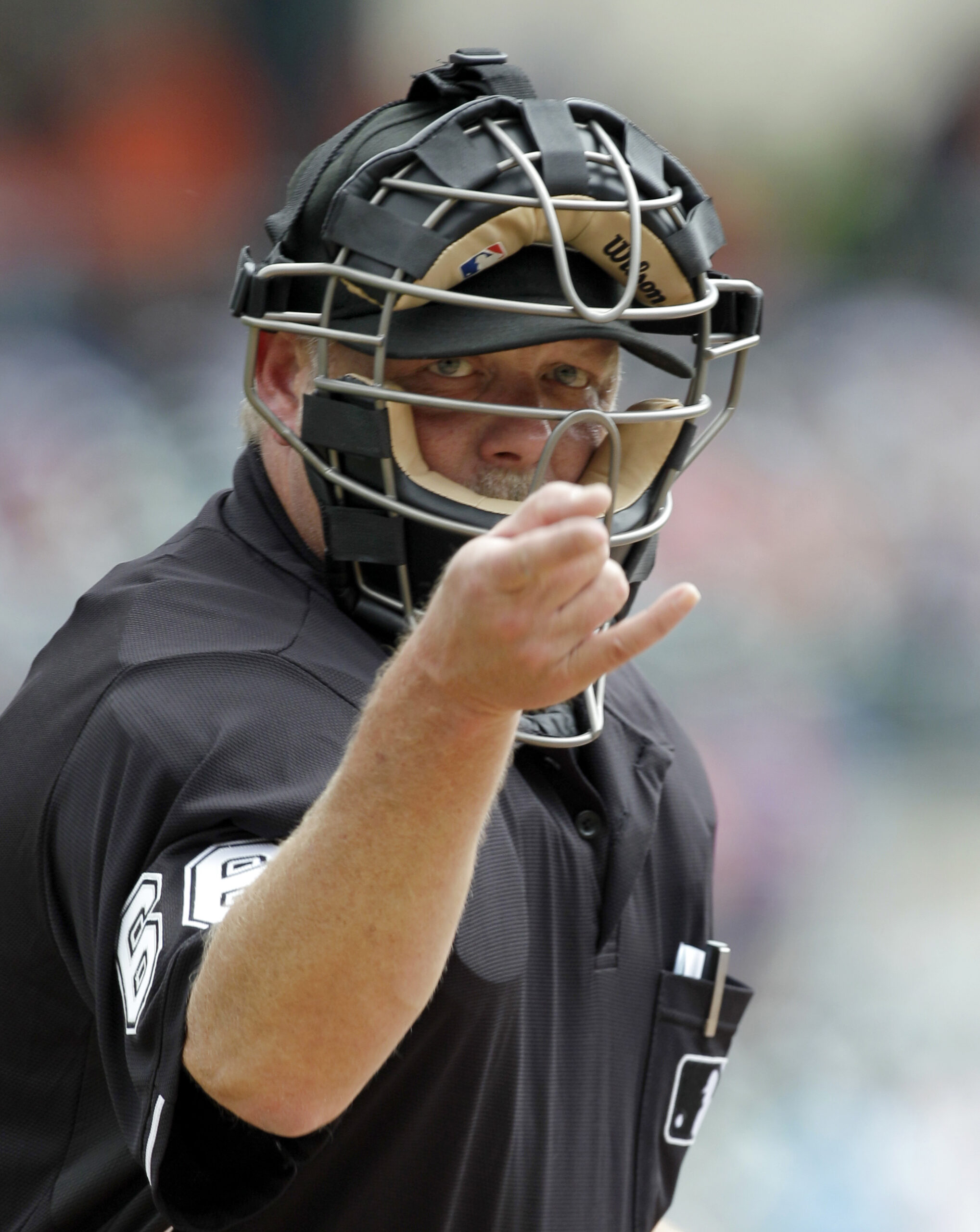 ** CORRECTS PERFECT GAME TO WEDNESDAY, NOT TUESDAY ** Home plate umpire Jim Joyce calls a strike during the first inning of a baseball game between the  Detroit Tigers and Cleveland Indians in Detroit Thursday, June 3, 2010. Tigers pitcher Armando Galarraga lost his bid for a perfect game with two outs in the ninth inning on a disputed call  at first base by Joyce on Wednesday night. (AP Photo/Paul Sancya) (Paul Sancya)