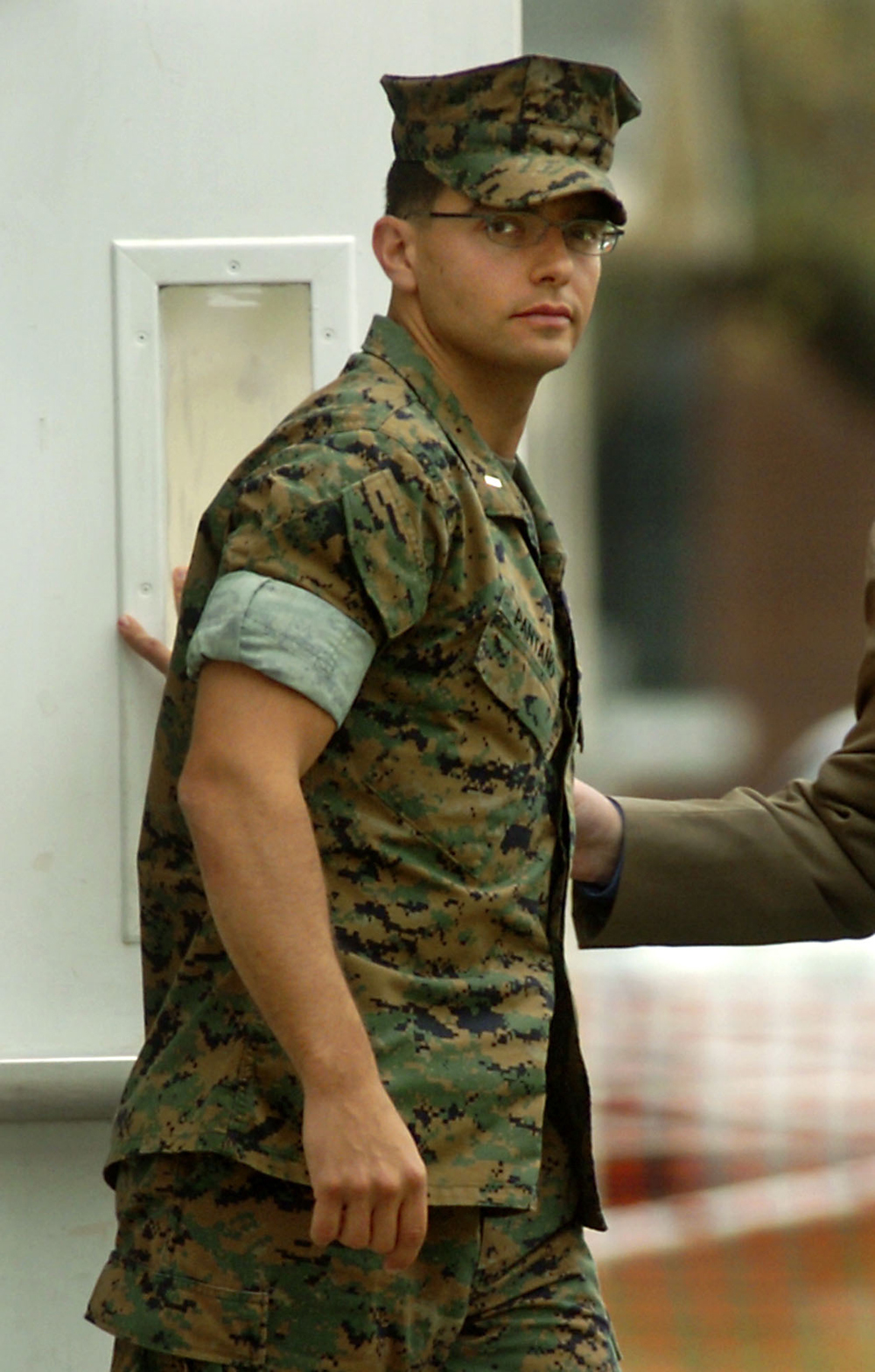 U.S. Marine Second Lt. Ilario Pantano exits the Legal Support Service Courtroom for a recess during his second day of his Artical 32 hearing Wednesday, April 27, 2005, in Camp Lejeune, N.C. Pantano, 33, is accused of murder for shooting two Iraqis in the back during a search for a terrorist hideout last year. (AP photo/Sara D. Davis) (Sara D.  Davis)