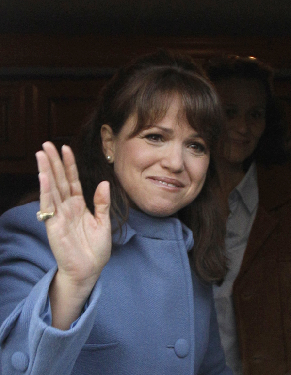 Delaware Republican U.S. Senate candidate Christine O'Donnell waves from inside a vehicle after voting, Tuesday, Nov. 2, 2010, in Wilmington, Del. O'Donnell is facing Democrat Chris Coons. (AP Photo/Rob Carr) (Rob Carr)