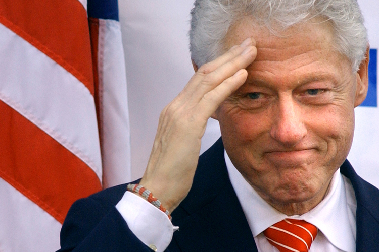 Bill Clinton returns a salute to the crowd as he stumps for Governor Joe Manchin in Beckley, W.Va., on Monday. Manchin is running against John Raese for the vacant seat of the late Sen. Robert Byrd.