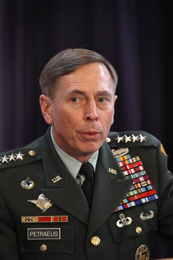 Gen. David Petraeus, the top U.S and NATO commander addresses RUSI members on The International Mission in Afghanistan', at the United Services Institute in central London, Friday Oct. 15, 2010.  Petraeus has confirmed that NATO has provided safe passage for top Taliban leaders to travel to Kabul for face-to-face negotiations with the American-backed Afghan government.    (AP Photo/Dan Kitwood, Pool) (AP)