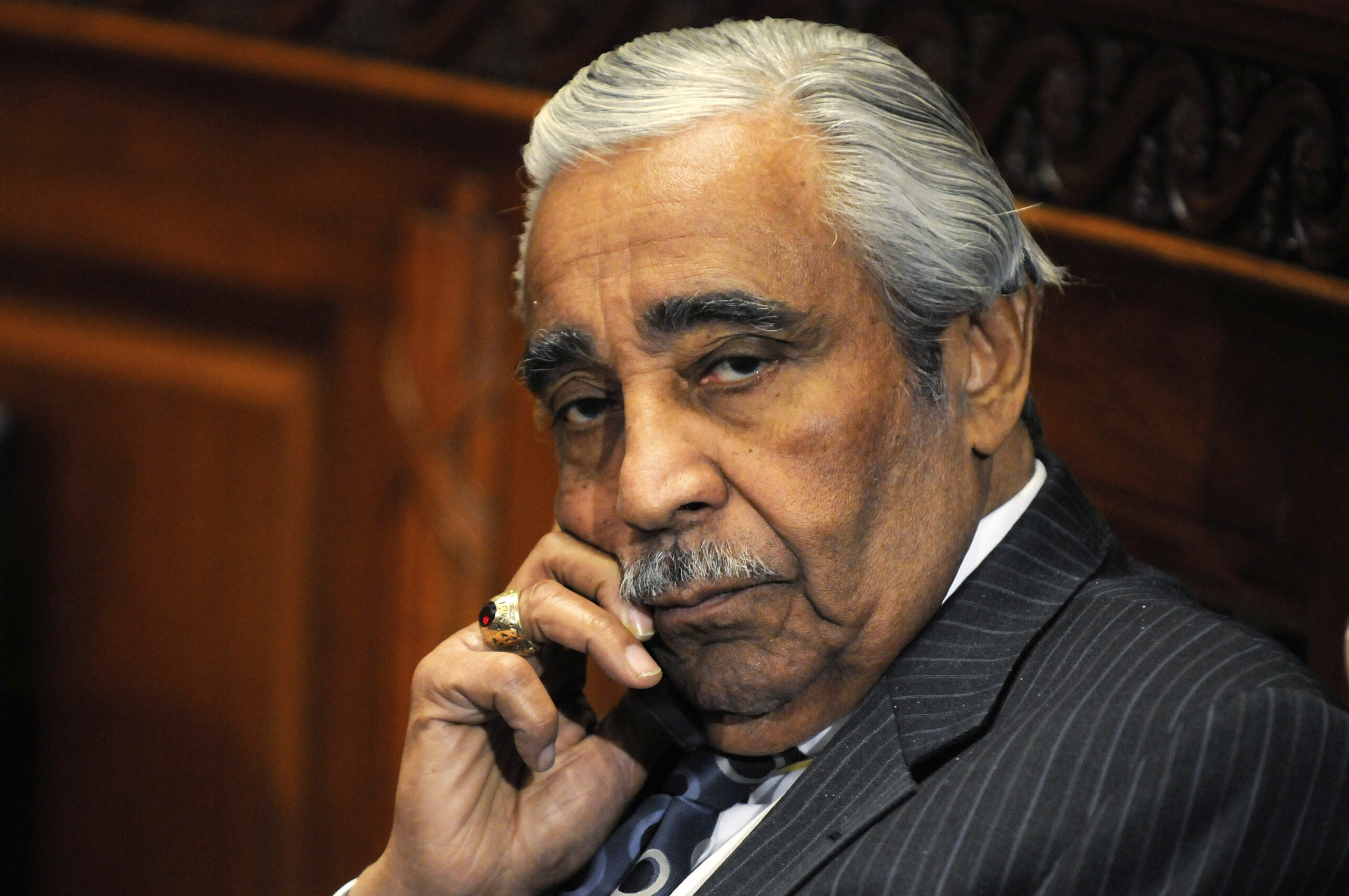 US Representative Charles Rangel (D-NY) talks on his mobile phone as he waits for the panel to return from a break in his ethics hearing before the House Adjudicatory subcommittee at Capitol Hill in Washington, November 18, 2010.    REUTERS/Jonathan Ernst    (UNITED STATES - Tags: CRIME LAW POLITICS) (Reuters)