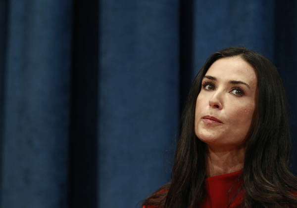 Actress Demi Moore speaks during a news conference at the United Nations Headquarters in New York, November 4, 2010.  Ashton Kutcher and Demi Moore are kicking off the launch of the UN Voluntary Trust Fund for Victims of Trafficking in Persons.  The Trust Fund will provide humanitarian, legal and financial aid to victims of trafficking and will be administered by the UN Office on Drugs and Crime.    REUTERS/Brendan McDermid (UNITED STATES  - Tags: POLITICS ENTERTAINMENT) (Â© Brendan Mcdermid / Reuters)