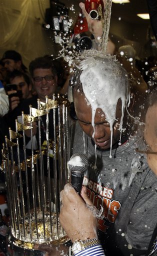 San Francisco Giants' Edgar Renteria celebrates with teammates after Game 5 of baseball's World Series against the Texas Rangers Monday, Nov. 1, 2010, in Arlington, Texas. The Giants won 3-1 to capture the World Series. (AP Photo/David J. Phillip) (AP)