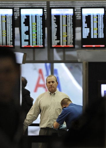 An airline passenger is patted down by a TSA agent at O'Hare International Airport in Chicago, Monday, Nov. 22, 2010. There are new requirements at some U.S. airports that air passengers must pass through full-body scanners that produce a virtually naked image. Those who refuse to go through the scanners are subject to thorough pat-down. (AP Photo/Paul Beaty) (AP)