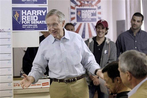 Senate Majority Leader Harry Reid of Nev. talks to campaign workers at his campaign headquarters in Las Vegas, Tuesday, Nov. 2, 2010. (AP Photo/Jae C. Hong) (AP)