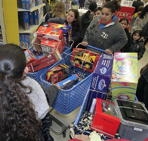 A traffic jam is negotiated in the aisles of Toys R Us, in San Rafael Calif., Thursday Nov. 25, 2010 which was crowed with Black Friday shoppers. (AP Photo/Mike Adaskaveg) (AP)