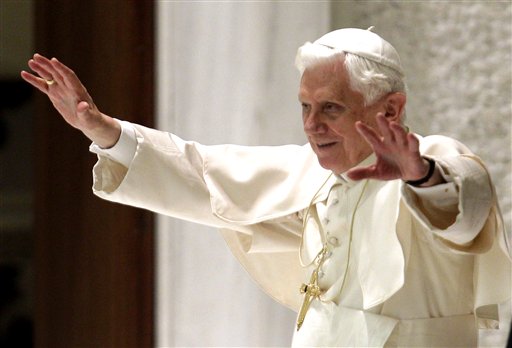 Pope Benedict XVI acknowledges faithful as he leaves after his weekly general audience, in Paul VI Hall, at the Vatican, Wednesday, Nov. 24, 2010. The Vatican on Wednesday denounced China for ordaining a bishop without papal consent, accusing the government-backed church of gravely damaging the faith, and warning that the bishop himself risked excommunication. Pope Benedict XVI learned of the ordination of Rev. Joseph Guo Jincai "with deep regret'' as it constituted a "grave violation'' of church law and hampered reconciliation efforts that have been a priority for the papacy, the Vatican press office said.(AP Photo/Andrew Medichini) (AP)