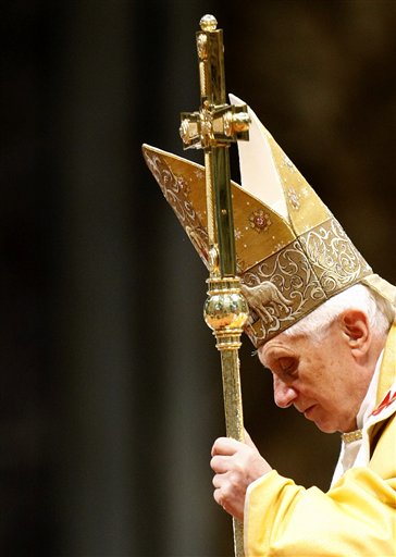 Pope Benedict XVI walks with the pastoral staff during a mass in St. Peter's Basilica, at the Vatican, Sunday, Nov. 21, 2010. The Pontiff formally created 24 new cardinals on Saturday amid cheers in St. Peter's Basilica, bringing a mostly Italian group into the elite club that will eventually elect his successor. (AP Photo/Pier Paolo Cito) (AP)