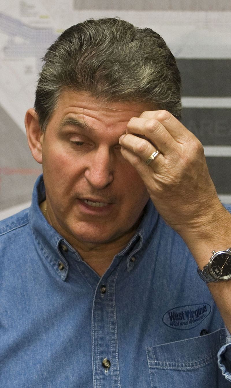 West Virginia Governor Joe Manchin gestures as he speaks during a news conference in Montcoal, West Virginia on April 7, 2010. Drills broke through into a West Virginia mine early on Wednesday but rescuers detected no sign of the four miners missing since an explosion killed 25 people in a major U.S. mine disaster.  REUTERS/Chris Keane (UNITED STATES - Tags: DISASTER ENERGY POLITICS) (Â© Chris Keane / Reuters)