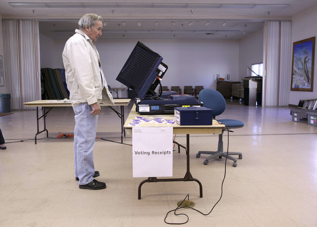 A resident of Searchlight, Nev. checks over his selections while voting in the general election at the town community center, Tuesday, Nov. 2, 2010, in Searchlight, Nev. (AP Photo/Julie Jacobson) (Julie Jacobson)
