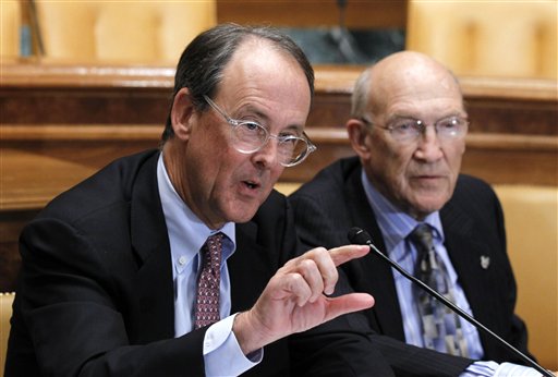 Erskine Bowles, left, accompanied by former Wyoming Sen. Alan Simpson. (AP/Alex Brandon)