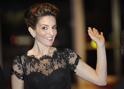 Tina Fey waves to fans as she arrives at the Kennedy Center where she was awarded the Mark Twain Prize for humor in Washington, Tuesday, Nov. 9, 2010. (AP Photo/Cliff Owen) (AP)
